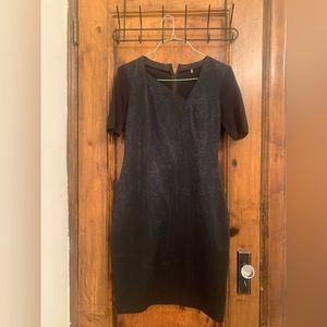 Elie Tahari edgy black with print in background dress.